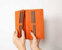Elegant trifold leather wallet with magnetic snap closure, featuring 12 card slots, a coin pouch, and a dedicated phone
pocket. This handcrafted wallet also includes secret compartments for receipts or cash, offering secure and organized
storage. A stylish and practical wallet for everyday use or gifts for women.