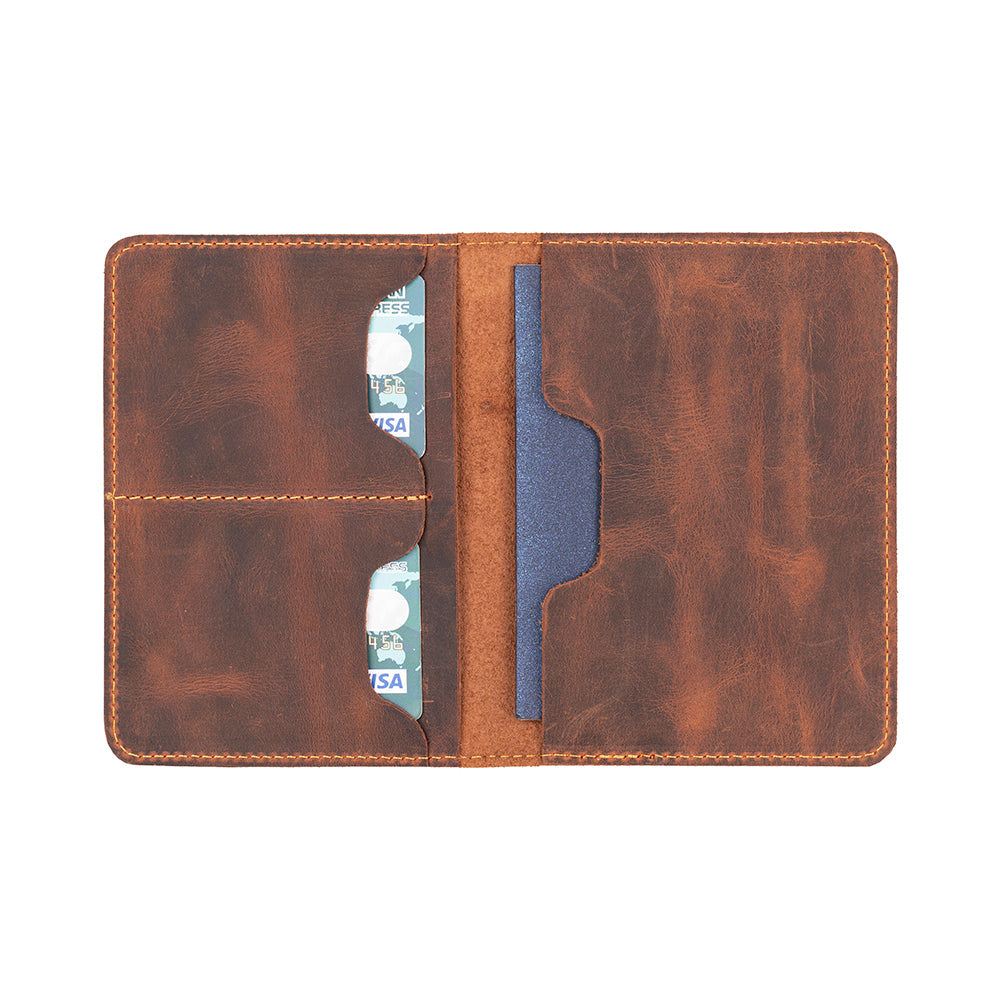 Handcrafted genuine leather passport wallet with 2 card slots, a secure passport compartment, and a cash/document
pocket. This compact travel accessory keeps essentials organized while providing a stylish, durable solution for frequent
travelers. Perfect for safe and elegant travel organization.