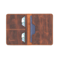 Handcrafted genuine leather passport wallet with 2 card slots, a secure passport compartment, and a cash/document
pocket. This compact travel accessory keeps essentials organized while providing a stylish, durable solution for frequent
travelers. Perfect for safe and elegant travel organization.