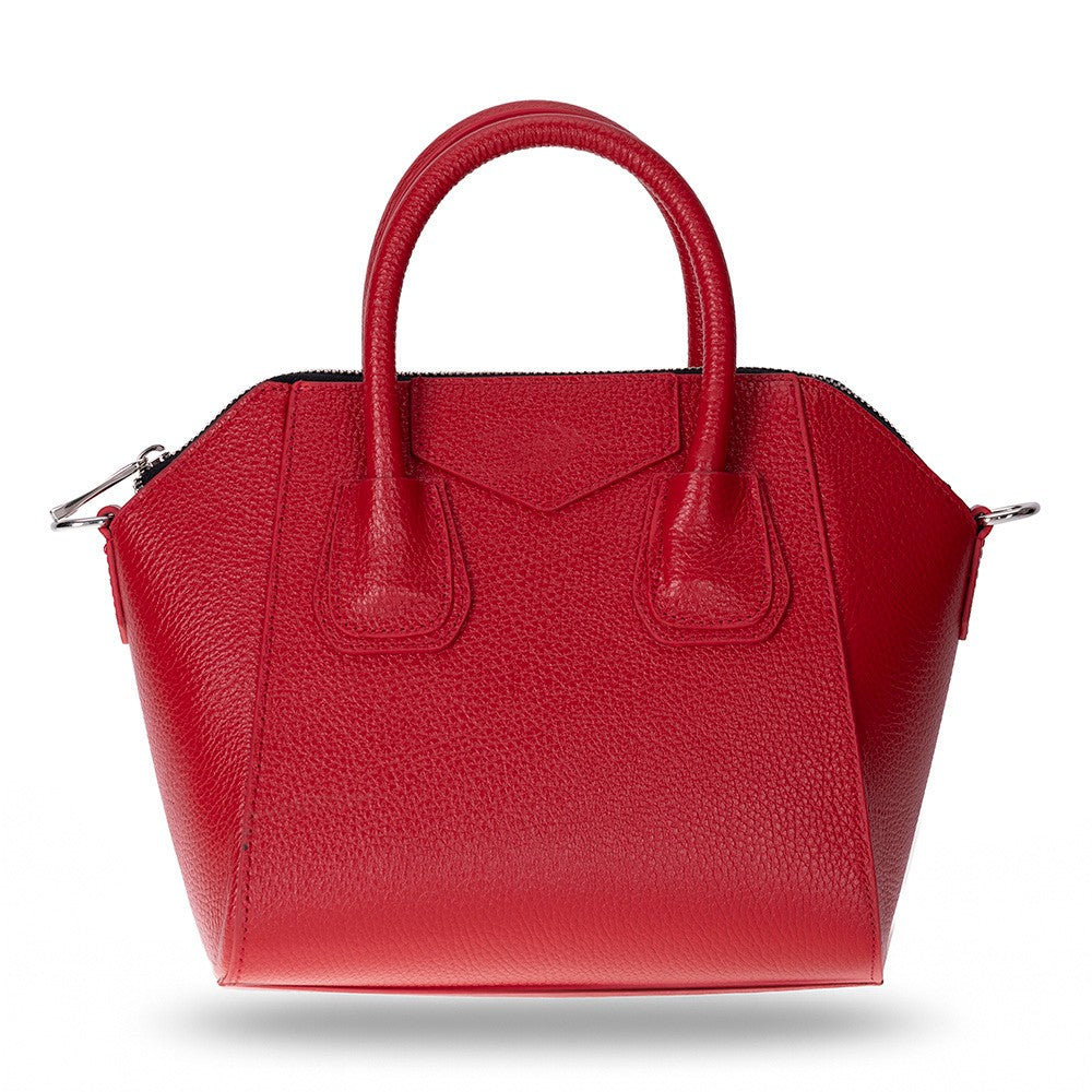 Elegant small leather handbag with a structured design, featuring top handles and an adjustable shoulder strap for
versatile carrying. This genuine leather bag offers a spacious interior with secure zipper closure and interior pockets. A
stylish everyday handbag perfect for work, outings, and daily essentials.