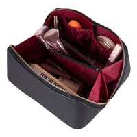 Premium leather zipper makeup bag with a spacious boxy design, ideal for storing cosmetics, toiletries, and travel
essentials. This water-resistant, durable bag features sturdy zippers and a convenient handle for easy carrying. A
versatile and stylish organizer for both men and women.