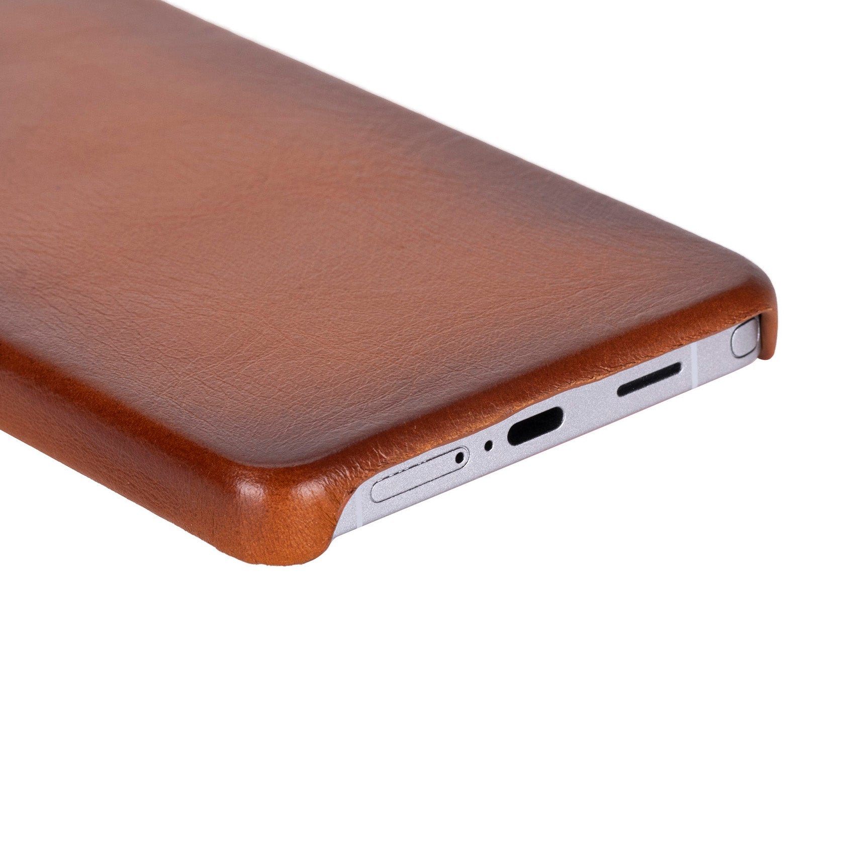 Premium Samsung Galaxy S26 Ultra leather phone case with a slim, elegant design and soft suede interior for added
protection. This ultra-thin, durable cover supports wireless charging and features raised edges to protect the camera
and screen. A stylish and functional handmade phone case perfect for everyday use.